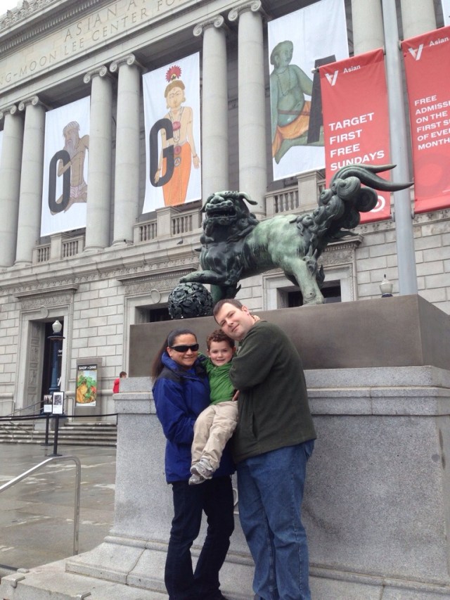 Erik, Joe and Lisamaria stand in front of the Asian Art Museum